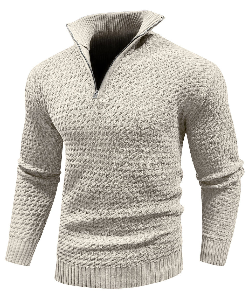 Beige knitted sweater with a high collar on a white background
