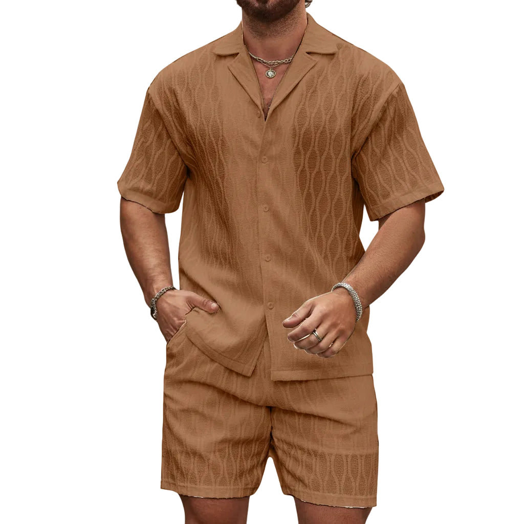 Man wearing a brown patterned shirt and shorts set on a white background