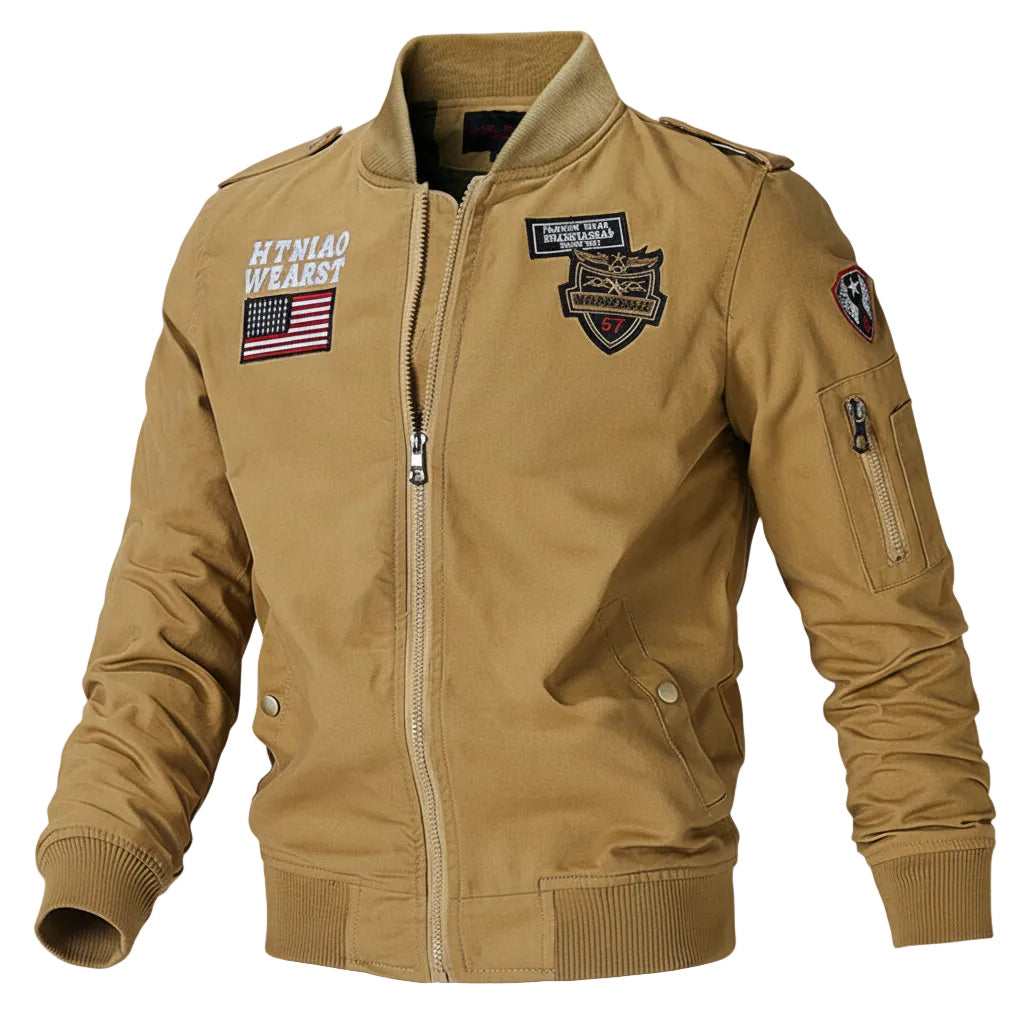 Tan bomber jacket with patches on a white background
