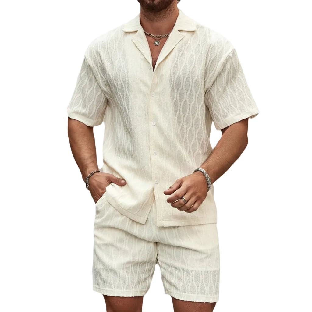 Man wearing a cream-colored linen shirt and shorts set on a white background