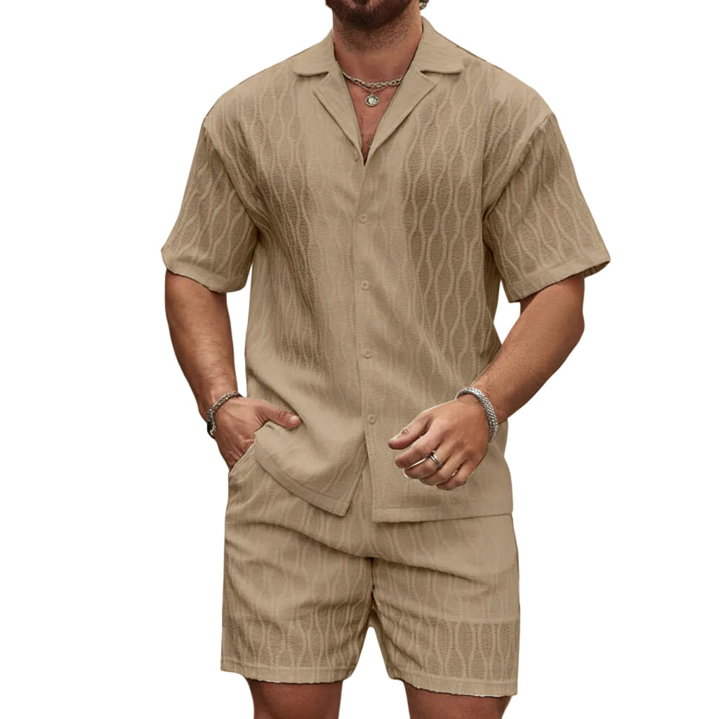 Man wearing a beige short-sleeve shirt and shorts set on a white background