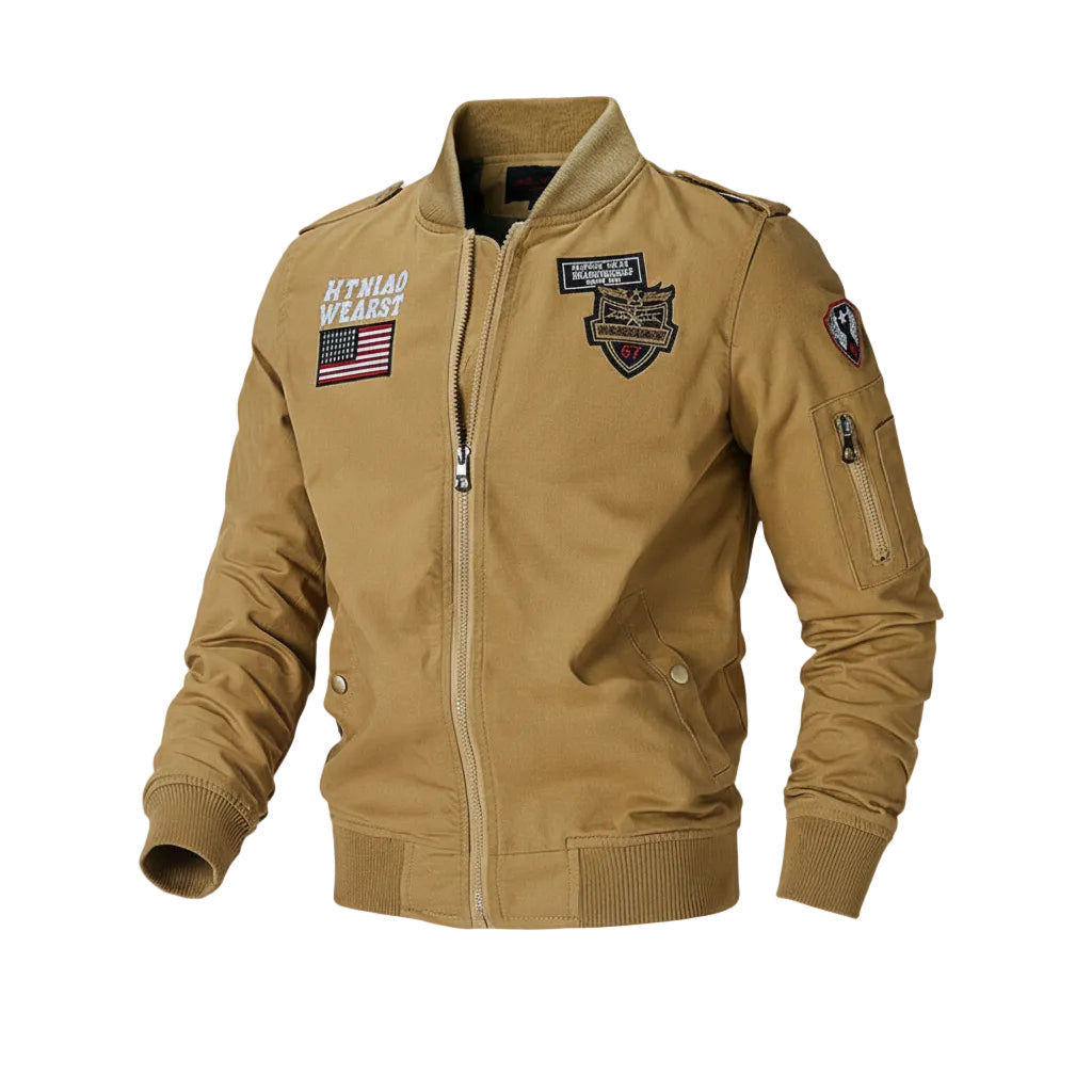 Tan bomber jacket with patches on a white background